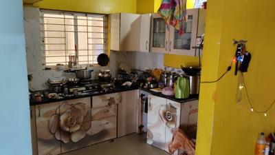 Kitchen Image of 699 Sq.ft 1 BHK Apartment / Flat for sale in Tulsi Aangan, Waghodia Road Vadodara for Rs. 1550000