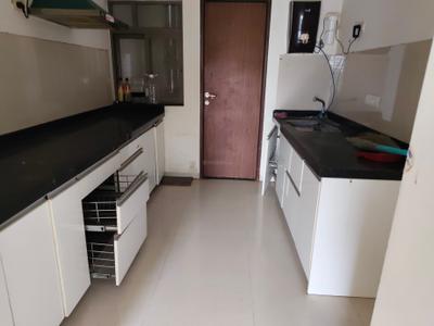 Kitchen Image of 950 Sq.ft 2 BHK Apartment / Flat for rent in Skyi Songbirds , Bhugaon Pune for Rs. 25000