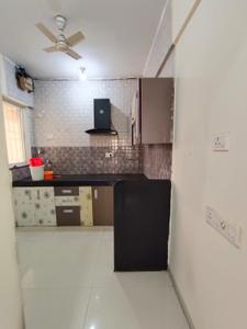 Kitchen Image of 1000 Sq.ft 2 BHK Apartment / Flat for rent in Essen Aishwaryam Comfort, Chinchwad Pune for Rs. 25000