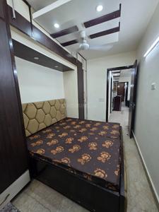 Bedroom Image of 1000 Sq.ft 2 BHK Builder Floor for rent in Ramesh Nagar New Delhi for Rs. 26000