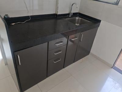 Kitchen Image of 660 Sq.ft 1 BHK Apartment / Flat for rent in Ajmera Exotica, Wagholi Pune for Rs. 15000