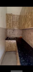Kitchen Image of 500 Sq.ft 1 BHK Builder Floor for rent in Ramesh Nagar New Delhi for Rs. 25000