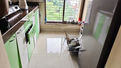 Kitchen Image of 700 Sq.ft 1 BHK Apartment / Flat for sale in Dheera Darshan Residency, Kalamboli Navi Mumbai for Rs. 4300000