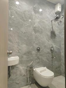 Common Bathroom Image of 490 Sq.ft 1 BHK Apartment / Flat for sale in Prithvi Anand Kuber Complex, Palghar Mumbai for Rs. 2079720