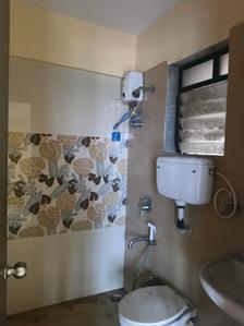 Bedroom Two Image of 1060 Sq.ft 2 BHK Apartment / Flat for sale in Laxmi Om Tanishq Residency, Kalyan West Kalyan for Rs. 5950000