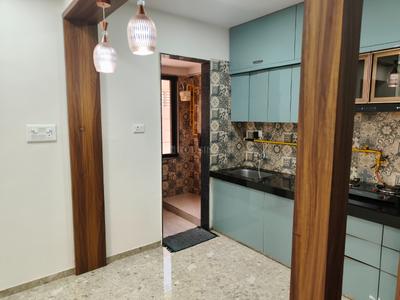 Kitchen Image of 634 Sq.ft 2 BHK Apartment / Flat for rent in Nagjua Tropical Greens, Kamli Falia Silvassa for Rs. 25000