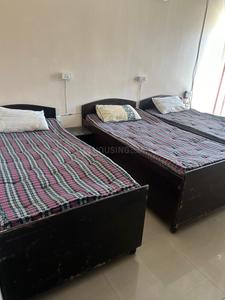 Bedroom Image of Jai Guruji PG  in Sector 143, Noida
