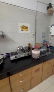 Kitchen Image of 610 Sq.ft 1 BHK Apartment / Flat for rent in Lunkad Queensland, Viman Nagar Pune for Rs. 35000