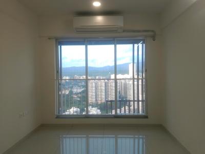 Living Room Image of 630 Sq.ft 1 BHK Apartment / Flat for sale in Godrej Nest, Kandivali East Mumbai for Rs. 12700000