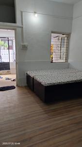 Bedroom Image of Radhey Krishna P.G Service in Memnagar, Ahmedabad