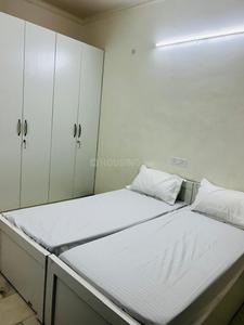 Bedroom Image of Boyz PG in Kotla Mubarakpur, New Delhi