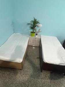 Bedroom Image of Rao pg in Sector 15, Gurgaon