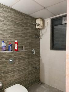 Common Bathroom Image of 850 Sq.ft 1.5 BHK Apartment / Flat for rent in Lodha Palava Downtown, Palava Phase 2 Thane for Rs. 21000