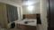 Sigra guru dev apartment Bedroom 2