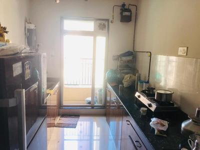 Kitchen Image of 950 Sq.ft 2 BHK Apartment / Flat for sale in Rustomjee Urbania Aurelia, Thane West Thane for Rs. 13700000