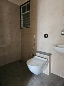 Common Bathroom Image of 1025 Sq.ft 2 BHK Apartment / Flat for sale in Mantra 29 Gold Coast, Dhanori Pune for Rs. 7800000