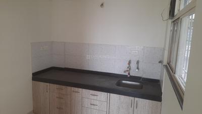 Kitchen Image of 550 Sq.ft 1 BHK Apartment / Flat for sale in Dhanori Pune for Rs. 5000000