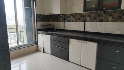 Kitchen Image of 910 Sq.ft 2 BHK Apartment / Flat for sale in Meet Ashok Smruti, Kasarvadavali Thane for Rs. 9990000
