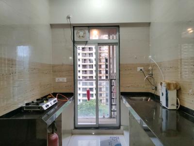 Kitchen Image of 920 Sq.ft 2 BHK Apartment / Flat for rent in Kasarvadavali Thane for Rs. 23000