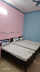 Bedroom Image of Dheeraj PG in Sector 19, Noida