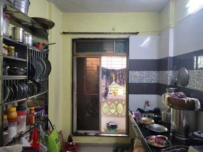 Kitchen Image of 700 Sq.ft 1 BHK Apartment / Flat for rent in Sahil Pride Residency Daffodil, Kasarvadavali Thane for Rs. 16444