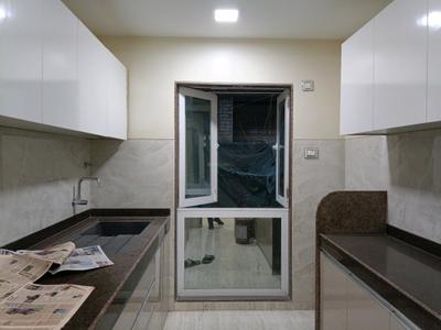Kitchen Image of 850 Sq.ft 2 BHK Apartment / Flat for sale in SMGK SMGK Associate Residency Wing B Phase 2 17th To 20th Floors, Jogeshwari West Mumbai for Rs. 21500000