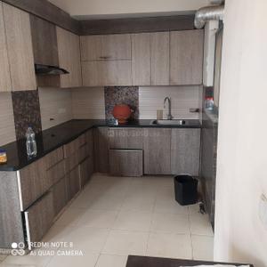 Kitchen Image of 900 Sq.ft 2 BHK Apartment / Flat for rent in Unitech Uniworld Gardens 2, Sector 47 Gurgaon for Rs. 39000
