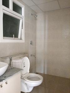Common Bathroom Image of 800 Sq.ft 1 BHK Apartment / Flat for sale in Bhartiya Nikoo Homes Phase 2, Tirumanahalli Bengaluru for Rs. 7500000