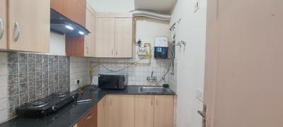 Kitchen Image of 610 Sq.ft 1 BHK Apartment / Flat for rent in Maxblis Grand Kingston, Sector 75 Noida for Rs. 30000