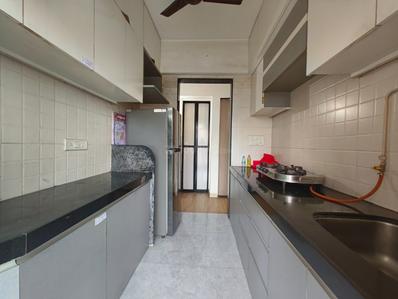 Kitchen Image of 760 Sq.ft 1.5 BHK Apartment / Flat for rent in Gajra Bhoomi Gardenia 1, Kalamboli Navi Mumbai for Rs. 25000