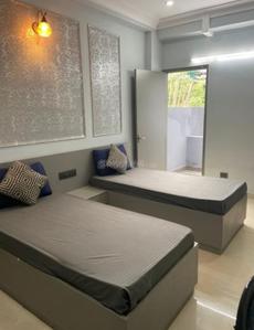 Bedroom Image of Hotel metro view pg  in Sector 52, Noida
