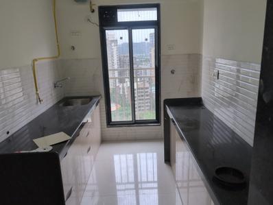 Kitchen Image of 890 Sq.ft 2 BHK Apartment / Flat for sale in Oxford Navrang Crystal, Goregaon West Mumbai for Rs. 19000000