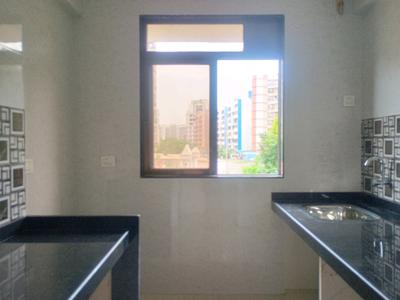 Kitchen Image of 664 Sq.ft 1 BHK Apartment / Flat for sale in Yuvi Raj Residency, Ambernath East Ambernath for Rs. 2500000