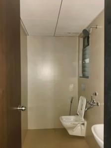 Common Bathroom Image of 770 Sq.ft 1.5 BHK Apartment / Flat for rent in Runwal Gardens Phase 2 Bldg No 13 17, Usarghar Thane for Rs. 15499