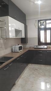 Kitchen Image of 1050 Sq.ft 2 BHK Builder Floor for rent in Sector 27 Gurgaon for Rs. 50000