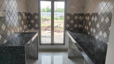 Kitchen Image of 675 Sq.ft 1 BHK Apartment / Flat for sale in Shilphata Thane for Rs. 3900000