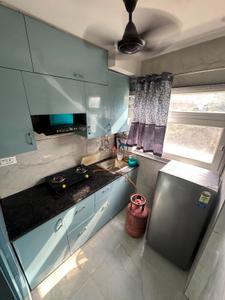 Kitchen Image of 400 Sq.ft 1 BHK Studio for rent in DLF Capital Greens Phase 1 And 2, Karampura New Delhi for Rs. 26000