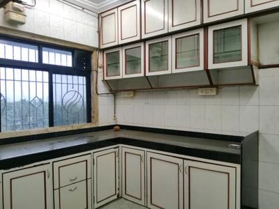 Kitchen Image of 900 Sq.ft 2 BHK Apartment / Flat for sale in Manisha Towers, Mulund East Mumbai for Rs. 16500000