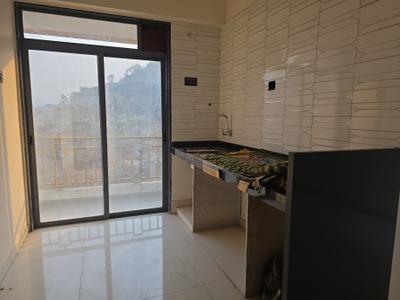 Kitchen Image of 710 Sq.ft 1 BHK Apartment / Flat for sale in Pushpak Nagar Navi Mumbai for Rs. 3800000