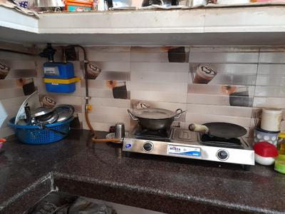 Kitchen Image of Radhe Radhe PG in Laxmi Nagar, New Delhi