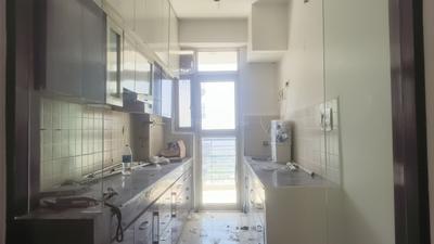 Kitchen Image of 1250 Sq.ft 2 BHK Apartment / Flat for rent in Ajnara Gen X, Crossings Republik Ghaziabad for Rs. 17000