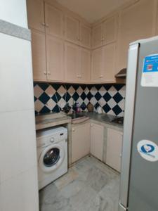 Kitchen Image of 1100 Sq.ft 1 BHK Builder Floor for rent in Hauz Khas New Delhi for Rs. 50000
