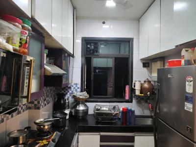 Kitchen Image of 585 Sq.ft 1 BHK Apartment / Flat for rent in Paradigm Pushpanjali Residency Phase III, Thane West Thane for Rs. 17999