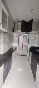 Kitchen Image of 650 Sq.ft 1 BHK Apartment / Flat for rent in Thakurli Thane for Rs. 12000