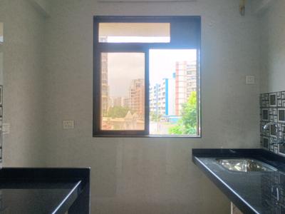 Kitchen Image of 611 Sq.ft 1 BHK Apartment / Flat for sale in Panvelkar Empire Wing A Wing A1 Wing B, Ambernath West Ambernath for Rs. 2400000