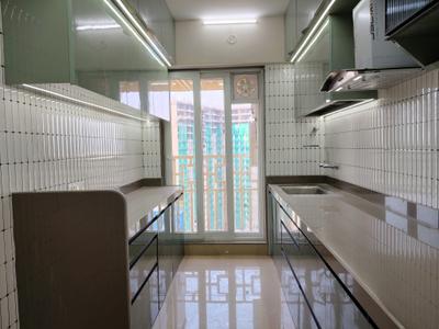 Kitchen Image of 855 Sq.ft 2 BHK Apartment / Flat for rent in Paradise Sai World City, Panvel Navi Mumbai for Rs. 40000