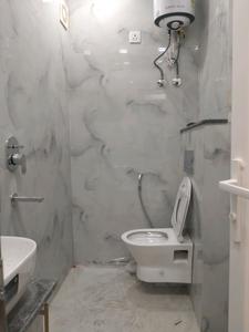 Common Bathroom Image of 370 Sq.ft 1 RK Apartment / Flat for rent in DLF Capital Greens, Karampura New Delhi for Rs. 24000