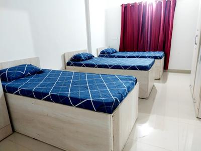 Bedroom Image of Blossom PG in Kharadi, Pune