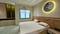 Parul Palm Green Bedroom 1