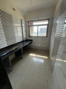 Kitchen Image of 730 Sq.ft 1 BHK Apartment / Flat for sale in Mohan Willows I, Badlapur East Badlapur for Rs. 2650000